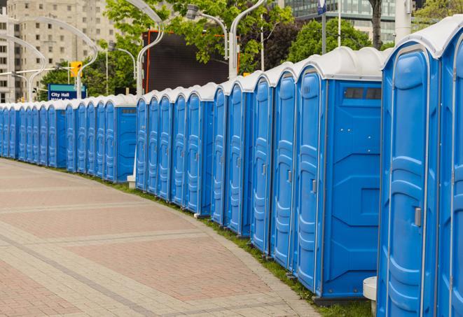 a line of portable restrooms set up for a wedding or special event, ensuring guests have access to comfortable and clean facilities throughout the duration of the celebration in Aberdeen, NJ